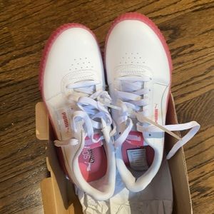 White pumas with pink sole